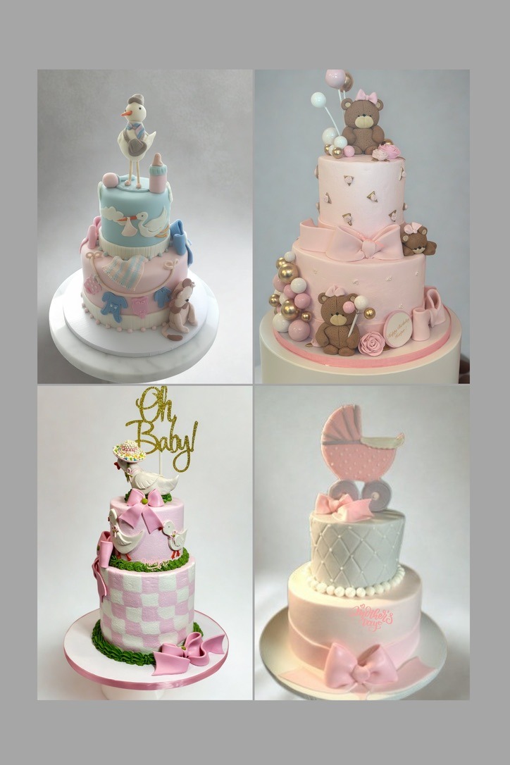 Baby shower cakes with a stork, teddy bears, an Oh Baby topper and a baby carriage topper