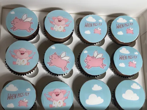 When Pigs Fly 40th birthday cupcakes with edible image toppers